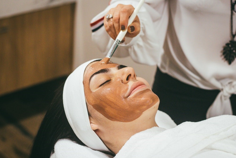 woman getting a facial treatment